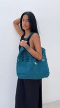 Load image into Gallery viewer, Konsum tote handmade from using 100% cotton. Available in many colors. In the picture, teal color.
